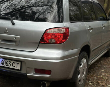 Сірий Міцубісі Аутлендер, об'ємом двигуна 2.38 л та пробігом 303 тис. км за 5200 $, фото 5 на Automoto.ua
