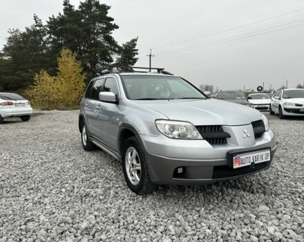 Серый Мицубиси Аутлендер, объемом двигателя 2.4 л и пробегом 260 тыс. км за 5750 $, фото 2 на Automoto.ua