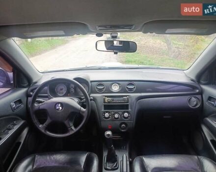 Сірий Міцубісі Аутлендер, об'ємом двигуна 2 л та пробігом 230 тис. км за 5200 $, фото 9 на Automoto.ua