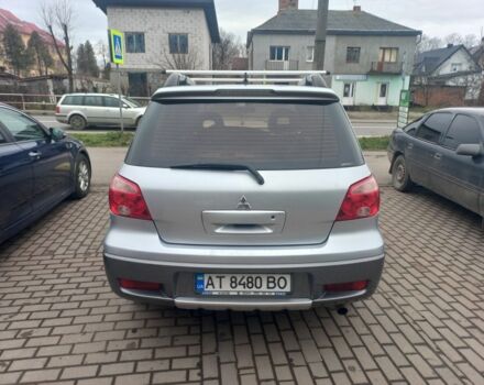 Серый Мицубиси Аутлендер, объемом двигателя 2.4 л и пробегом 246 тыс. км за 5500 $, фото 3 на Automoto.ua