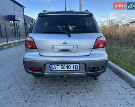 Серый Мицубиси Аутлендер, объемом двигателя 2 л и пробегом 220 тыс. км за 4550 $, фото 8 на Automoto.ua