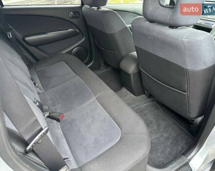 Серый Мицубиси Аутлендер, объемом двигателя 2 л и пробегом 236 тыс. км за 6600 $, фото 10 на Automoto.ua