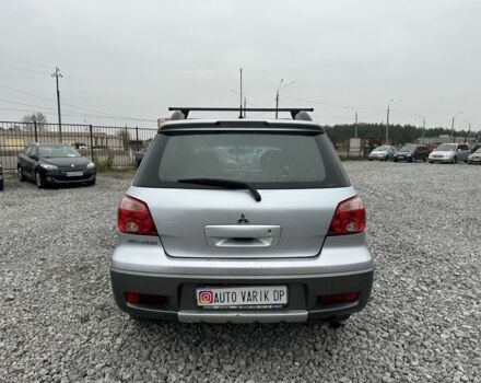 Серый Мицубиси Аутлендер, объемом двигателя 2.4 л и пробегом 260 тыс. км за 5750 $, фото 4 на Automoto.ua