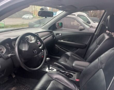 Серый Мицубиси Аутлендер, объемом двигателя 2.4 л и пробегом 246 тыс. км за 5500 $, фото 6 на Automoto.ua