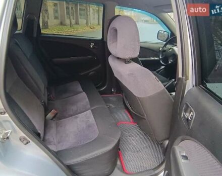 Серый Мицубиси Аутлендер, объемом двигателя 2.38 л и пробегом 266 тыс. км за 6399 $, фото 20 на Automoto.ua