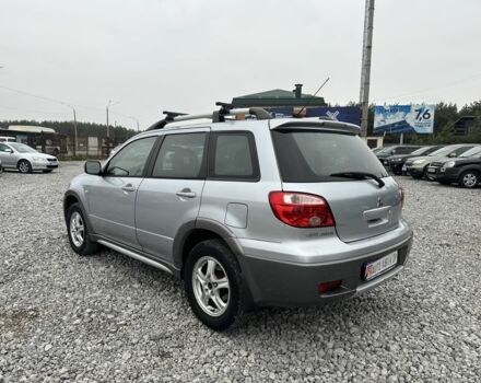Серый Мицубиси Аутлендер, объемом двигателя 2.4 л и пробегом 260 тыс. км за 5750 $, фото 5 на Automoto.ua