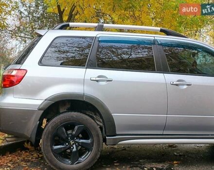 Серый Мицубиси Аутлендер, объемом двигателя 2.38 л и пробегом 266 тыс. км за 6399 $, фото 7 на Automoto.ua