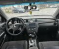 Серый Мицубиси Аутлендер, объемом двигателя 2.4 л и пробегом 260 тыс. км за 5750 $, фото 7 на Automoto.ua