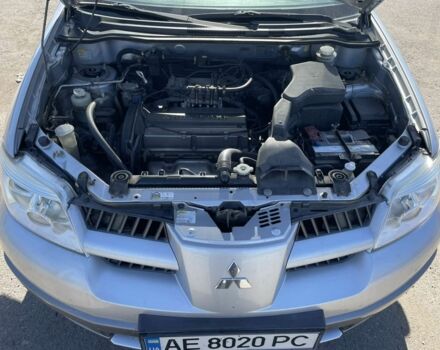 Серый Мицубиси Аутлендер, объемом двигателя 2 л и пробегом 225 тыс. км за 5999 $, фото 13 на Automoto.ua