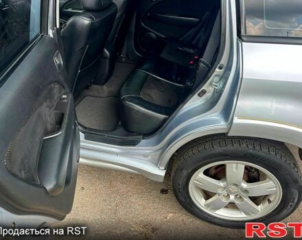 Сірий Міцубісі Аутлендер, об'ємом двигуна 2 л та пробігом 250 тис. км за 5800 $, фото 3 на Automoto.ua