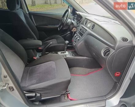 Серый Мицубиси Аутлендер, объемом двигателя 2.38 л и пробегом 266 тыс. км за 6399 $, фото 21 на Automoto.ua