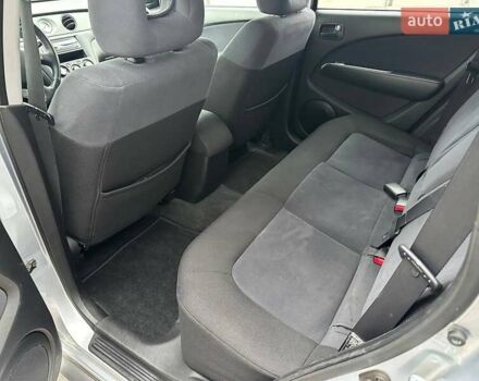 Серый Мицубиси Аутлендер, объемом двигателя 2 л и пробегом 236 тыс. км за 6600 $, фото 9 на Automoto.ua