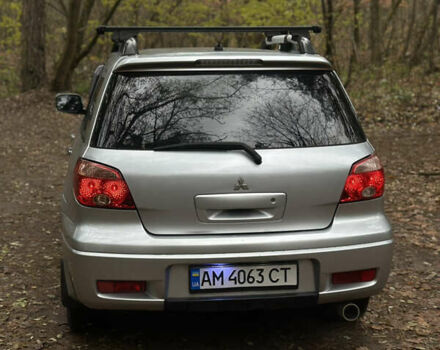 Сірий Міцубісі Аутлендер, об'ємом двигуна 2.38 л та пробігом 303 тис. км за 5200 $, фото 3 на Automoto.ua