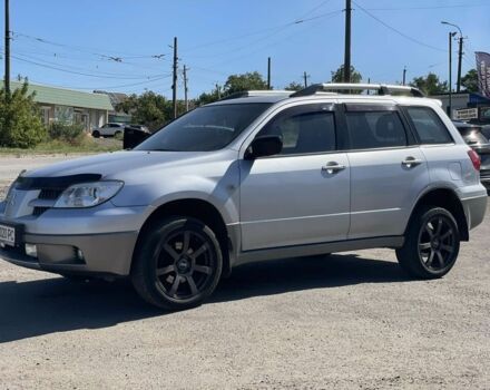 Серый Мицубиси Аутлендер, объемом двигателя 2 л и пробегом 225 тыс. км за 5999 $, фото 6 на Automoto.ua