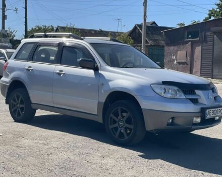 Серый Мицубиси Аутлендер, объемом двигателя 2 л и пробегом 225 тыс. км за 5999 $, фото 1 на Automoto.ua