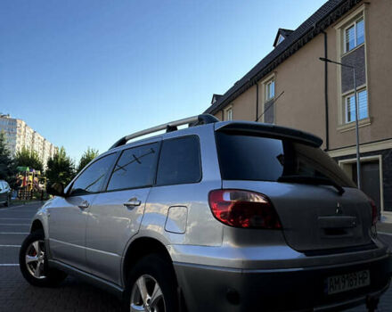 Серый Мицубиси Аутлендер, объемом двигателя 2 л и пробегом 316 тыс. км за 6500 $, фото 3 на Automoto.ua