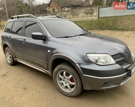 Сірий Міцубісі Аутлендер, об'ємом двигуна 2.4 л та пробігом 230 тис. км за 5927 $, фото 2 на Automoto.ua