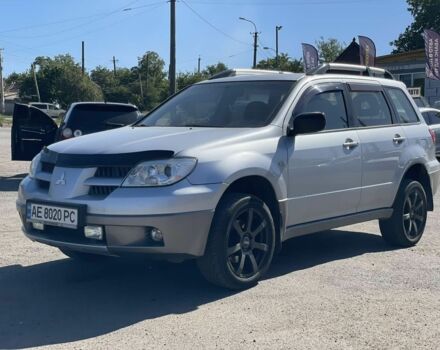 Серый Мицубиси Аутлендер, объемом двигателя 2 л и пробегом 225 тыс. км за 5999 $, фото 7 на Automoto.ua