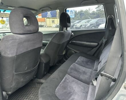 Серый Мицубиси Аутлендер, объемом двигателя 2.4 л и пробегом 260 тыс. км за 5750 $, фото 6 на Automoto.ua