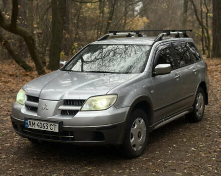 Сірий Міцубісі Аутлендер, об'ємом двигуна 2.38 л та пробігом 303 тис. км за 5200 $, фото 8 на Automoto.ua
