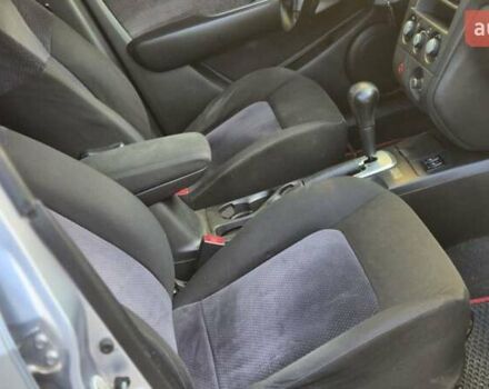 Сірий Міцубісі Аутлендер, об'ємом двигуна 2.4 л та пробігом 259 тис. км за 5999 $, фото 23 на Automoto.ua