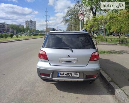 Сірий Міцубісі Аутлендер, об'ємом двигуна 2.4 л та пробігом 195 тис. км за 6900 $, фото 4 на Automoto.ua