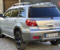 Сірий Міцубісі Аутлендер, об'ємом двигуна 2.4 л та пробігом 259 тис. км за 5999 $, фото 14 на Automoto.ua