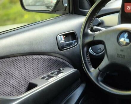 Сірий Міцубісі Аутлендер, об'ємом двигуна 2.4 л та пробігом 259 тис. км за 5999 $, фото 21 на Automoto.ua