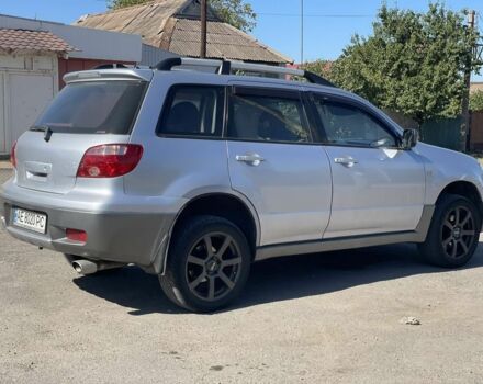 Серый Мицубиси Аутлендер, объемом двигателя 2 л и пробегом 225 тыс. км за 5999 $, фото 3 на Automoto.ua