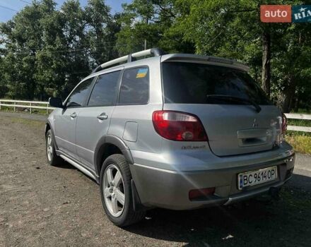 Сірий Міцубісі Аутлендер, об'ємом двигуна 2.38 л та пробігом 165 тис. км за 6000 $, фото 11 на Automoto.ua