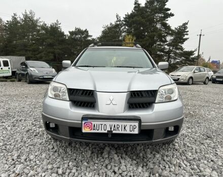 Серый Мицубиси Аутлендер, объемом двигателя 2.4 л и пробегом 260 тыс. км за 5750 $, фото 1 на Automoto.ua