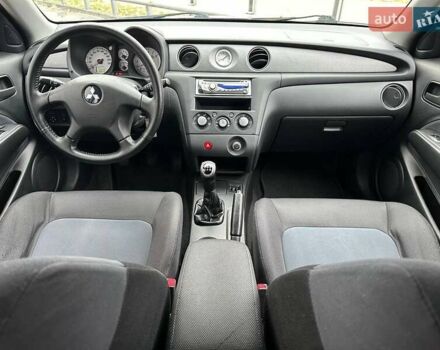 Серый Мицубиси Аутлендер, объемом двигателя 2 л и пробегом 236 тыс. км за 6600 $, фото 7 на Automoto.ua