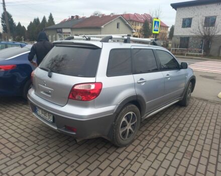 Серый Мицубиси Аутлендер, объемом двигателя 2.4 л и пробегом 246 тыс. км за 5500 $, фото 4 на Automoto.ua