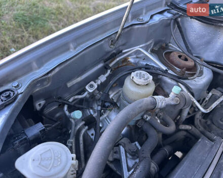 Серый Мицубиси Аутлендер, объемом двигателя 2 л и пробегом 220 тыс. км за 4550 $, фото 28 на Automoto.ua