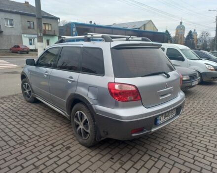 Серый Мицубиси Аутлендер, объемом двигателя 2.4 л и пробегом 246 тыс. км за 5500 $, фото 5 на Automoto.ua