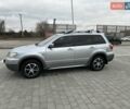 Серый Мицубиси Аутлендер, объемом двигателя 2.38 л и пробегом 246 тыс. км за 5500 $, фото 5 на Automoto.ua