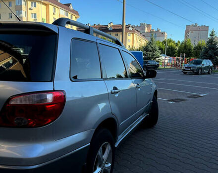 Серый Мицубиси Аутлендер, объемом двигателя 2 л и пробегом 316 тыс. км за 6500 $, фото 5 на Automoto.ua