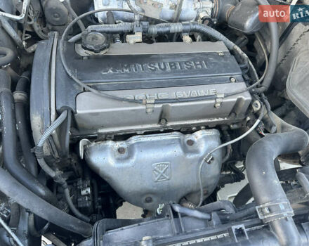 Серый Мицубиси Аутлендер, объемом двигателя 2 л и пробегом 220 тыс. км за 4550 $, фото 24 на Automoto.ua