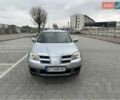 Серый Мицубиси Аутлендер, объемом двигателя 2.38 л и пробегом 246 тыс. км за 5500 $, фото 1 на Automoto.ua