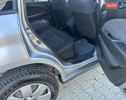 Серый Мицубиси Аутлендер, объемом двигателя 2 л и пробегом 220 тыс. км за 4550 $, фото 9 на Automoto.ua