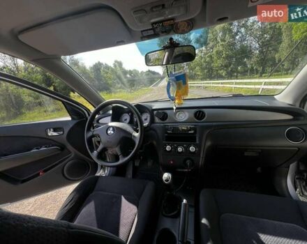 Сірий Міцубісі Аутлендер, об'ємом двигуна 2.38 л та пробігом 165 тис. км за 6000 $, фото 4 на Automoto.ua