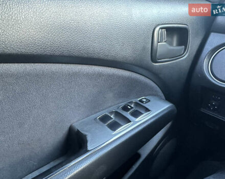 Серый Мицубиси Аутлендер, объемом двигателя 2 л и пробегом 220 тыс. км за 4550 $, фото 22 на Automoto.ua