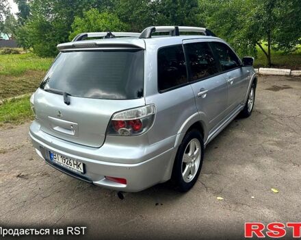 Сірий Міцубісі Аутлендер, об'ємом двигуна 2 л та пробігом 250 тис. км за 5800 $, фото 10 на Automoto.ua