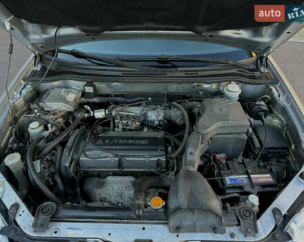 Серый Мицубиси Аутлендер, объемом двигателя 2 л и пробегом 316 тыс. км за 6500 $, фото 7 на Automoto.ua