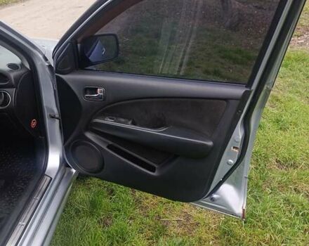 Сірий Міцубісі Аутлендер, об'ємом двигуна 2 л та пробігом 230 тис. км за 5200 $, фото 10 на Automoto.ua