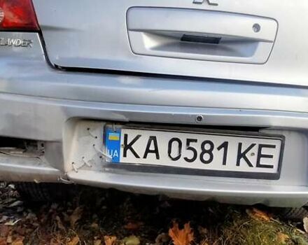Міцубісі Аутлендер 2005 у Хмельницькому на Automoto.ua Сірий Міцубісі Аутлендер, об'ємом двигуна 2.38 л та пробігом 247 тис. км за 6200 $, фото 1 на Automoto.ua