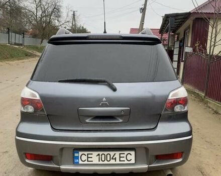 Сірий Міцубісі Аутлендер, об'ємом двигуна 2.4 л та пробігом 230 тис. км за 5927 $, фото 1 на Automoto.ua