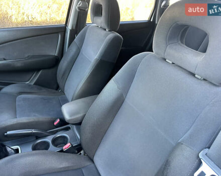 Серый Мицубиси Аутлендер, объемом двигателя 2 л и пробегом 220 тыс. км за 4550 $, фото 21 на Automoto.ua