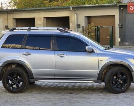 Сірий Міцубісі Аутлендер, об'ємом двигуна 2.4 л та пробігом 259 тис. км за 5999 $, фото 1 на Automoto.ua