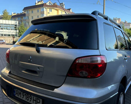 Серый Мицубиси Аутлендер, объемом двигателя 2 л и пробегом 316 тыс. км за 6500 $, фото 6 на Automoto.ua